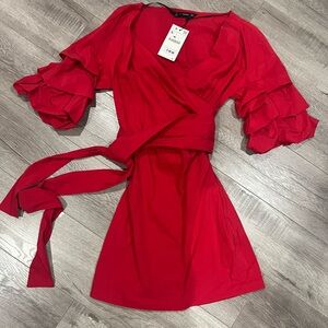 Woman’s Zara dress size small. Brand new. Tags attached.